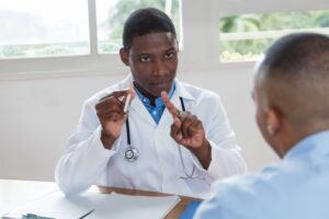 doctor telling a patient to quit smoking